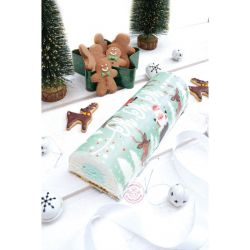 Bûche de Noël décorée avec un rouleau de pâte à sucre